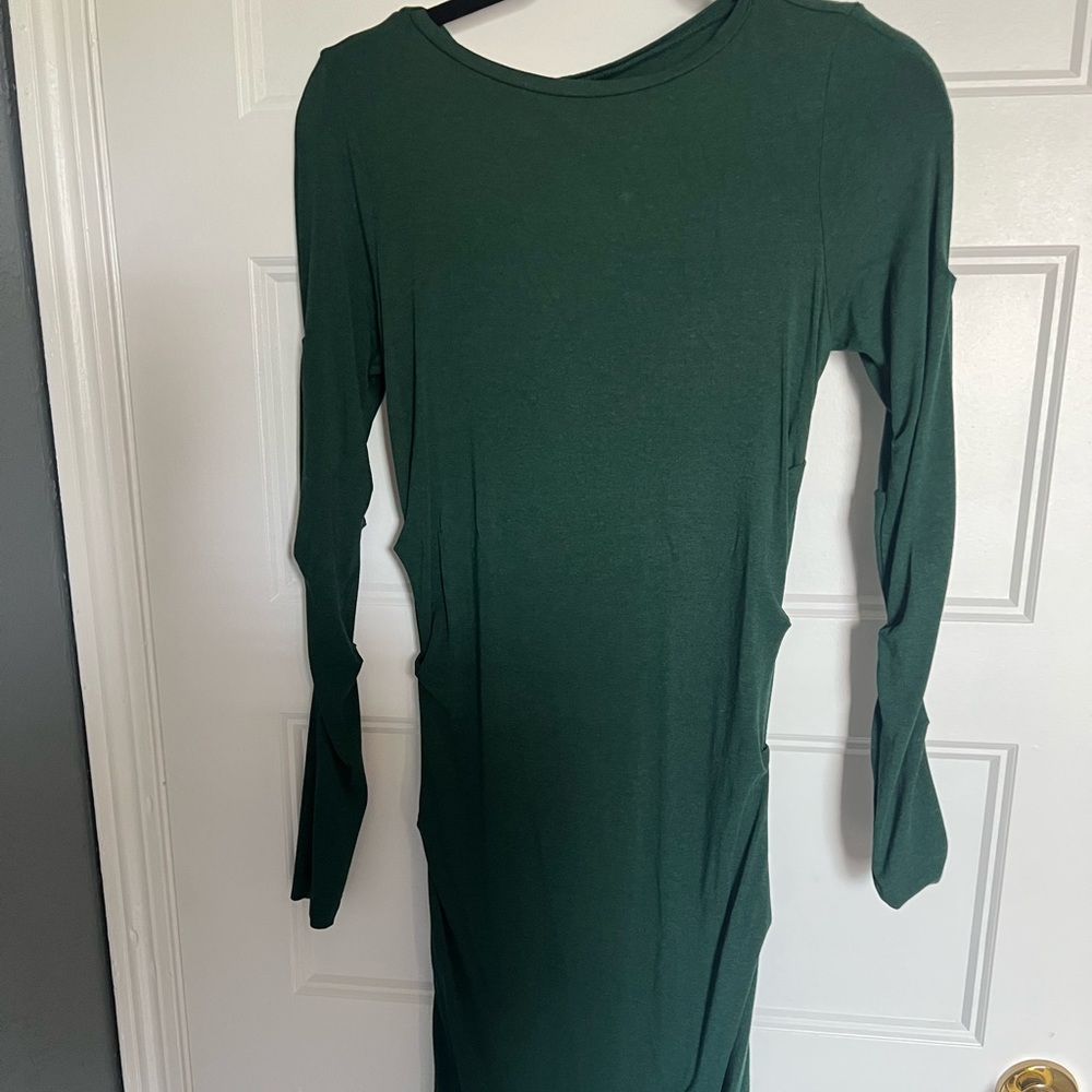 Nicole Miller cocktail dress; dark green. Slightly used in great condition